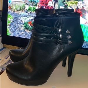 Black leather stretch boots